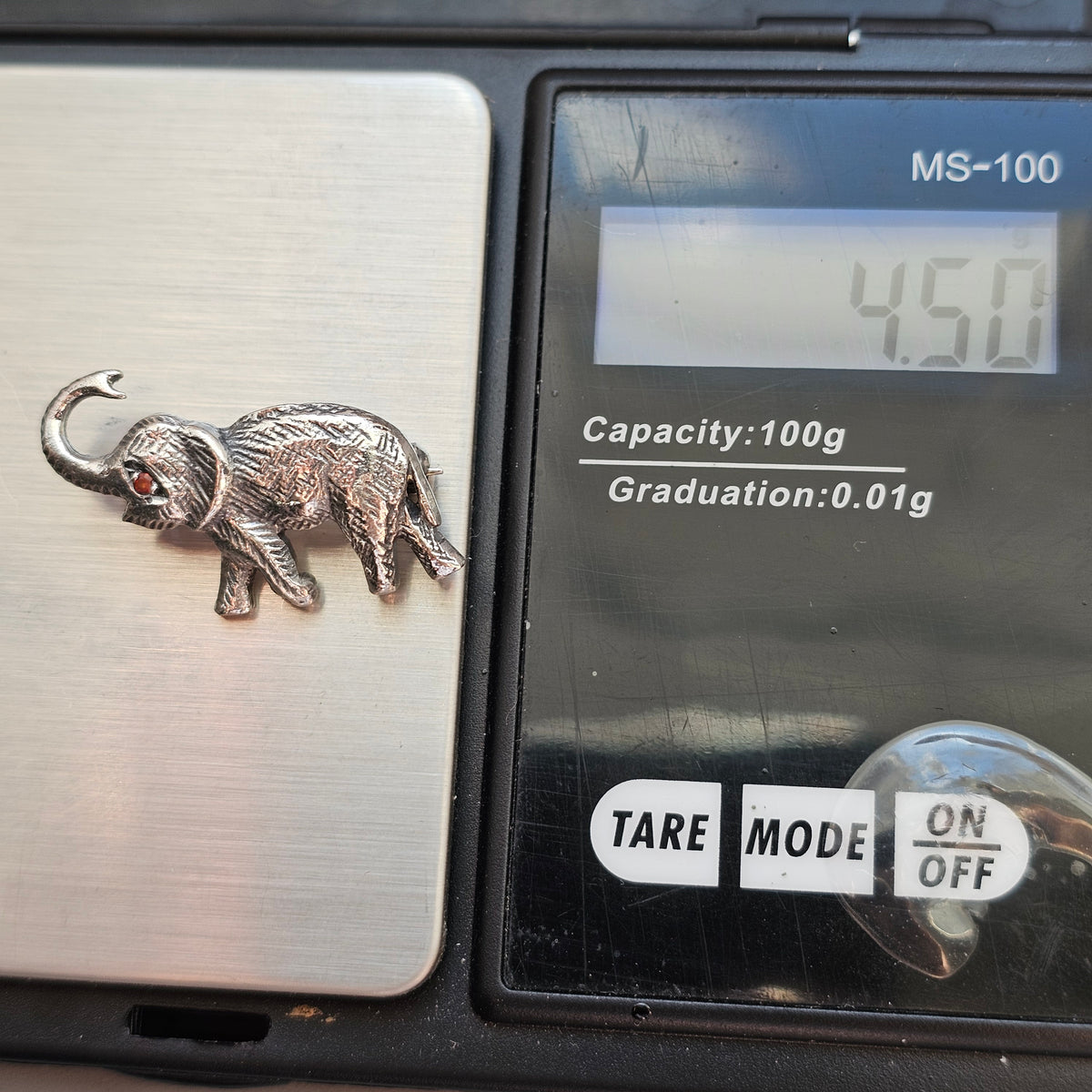 Sterling Silver Elephant Brooch with Garnet Eye