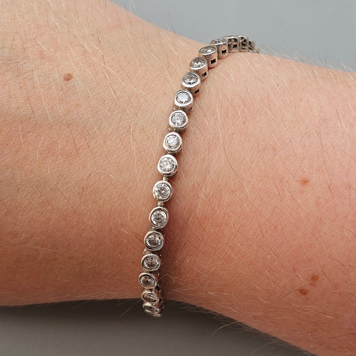 Contemporary Hallmarked Sterling Silver Cubic Zirconia Tennis Bracelet